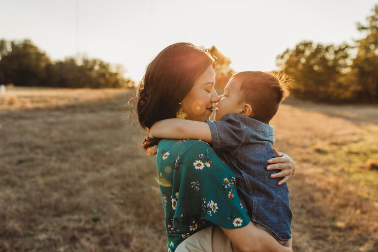 mother embracing her son 